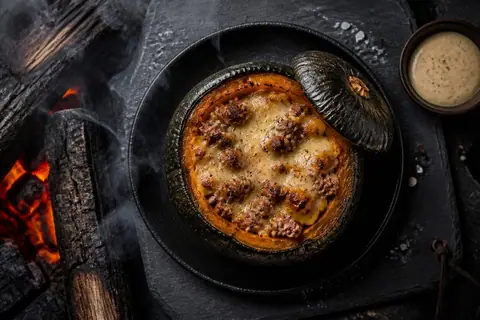 Ricetta Zucca Farcita con Salsiccia e Taleggio